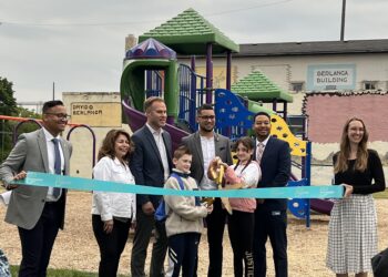 Latinx board members, Director and dance students cutting the ribbon to the new Latinx Community Playground