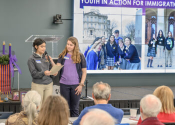Cristo Rey Junior Kaylee Razo does a shout out for Strangers No Longer's Youth in Action for Immigration. She is Advocacy Chair of the youth contingent of SNL