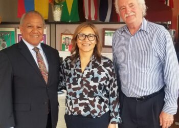 : Left to right, Rogelio Landin, Julie Chavez Rodriguez and Robert Dewaelsche following the interview with Ms. Chavez Rodriguez in the office of EL CENTRAL in Southwest Detroit.