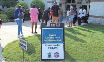 Residents wait for the opening of an enrollment event for the city of Detroit's Lifeline Plan, a water affordability program, at the Second Ebenezer Church on Aug. 9. PROVIDED BY THE DETROIT WATER AND SEWERAGE DEPARTMENT