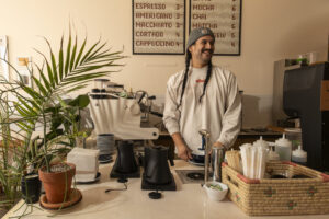 David Valdez, co-owner and operator of ALBA in Corktown, built the café as a welcoming space for Detroiters to enjoy quality coffee and meaningful connections, drawing inspiration from his experiences as a barista and his Mexican roots. Photo by Alejandro Ugalde Sandoval