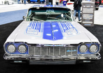 A 1964 Chevy Impala custom painted and pinstriped in Detroit Lions’ color sits on display in theAuto Show’s display paying tribute to the lowrider culture in Southwest Detroit.
