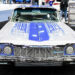 A 1964 Chevy Impala custom painted and pinstriped in Detroit Lions’ color sits on display in theAuto Show’s display paying tribute to the lowrider culture in Southwest Detroit.