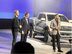 At left: Jared Goff – Lions QB and Jim Farley – Ford CEO. Photo by Mike Alberts