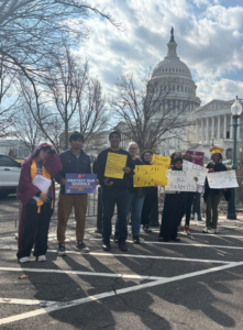 482forward members pose in front of the U.S. Capitol in the protest action against Linda McMahon