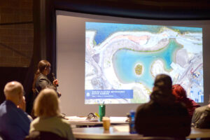 Rhonda Collins, Construction Manager presents updates on the Riverfront Conservancy projects at a community meeting held March 6, 2025. Photo by Renee Rodriguez