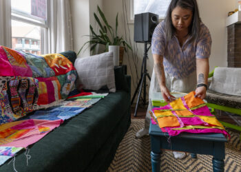 ina Tse during the Commemorative Quilt Project at Neighborhood Art School in Detroit, Michigan, on April 19, 2025. Held ahead of Detroit Fashion Revolution Week, the event honors garment workers lost in the 2013 Rana Plaza collapse in Bangladesh