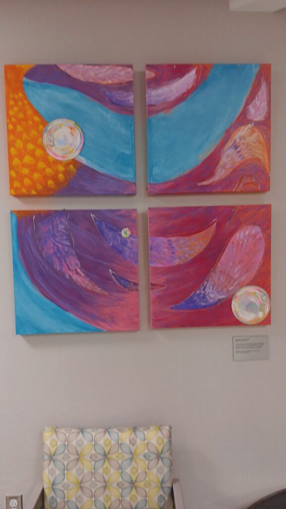Yadi's calming painting hangs in the waiting room in the neonatal unit at Children's Hospital of Michigan