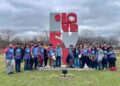 Photo of Cesar Chavez Academy’s High School Robotics team, the AzTech Eagles, after their successful performance at the FIRST State Robotics Competition. Photo taken by the AzTech Eagles robotics team.