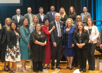 Keynote speaker Curtis Farmer (center) with Comerica employees and representatives of LA SED leadership.