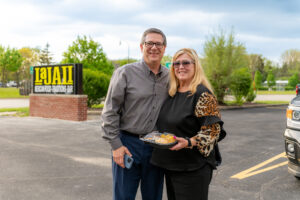 Stephen Poloni, 66, and Kathy Poloni, 63, of Taylor, MI., pose outside La Jali on Telegraph Road in Taylor on Monday, May 5, 2025. The couple had eagerly awaited the opening of the new restaurant. “Everything tasted homemade,” said Kathy. “The food was excellent, and the chips were fantastic.”