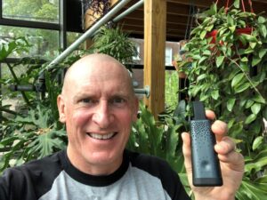 Southwest Detroit resident Ed Gies holds his personal air quality monitor. He experienced a petroleum odor while on a walk to Delray Park, near Historic Fort Wayne, in April. Photo courtesy of Ed Gies.
