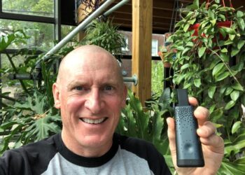 Southwest Detroit resident Ed Gies holds his personal air quality monitor. He experienced a petroleum odor while on a walk to Delray Park, near Historic Fort Wayne, in April. Photo courtesy of Ed Gies.