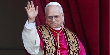 Pope Leo XIV, the former Cardinal Robert F. Prevost, waves from the central balcony of St. Peter's Basilica at the Vatican after his election as pope May 8, 2025. The new pope was born in Chicago. (CNS photo/Lola Gomez)