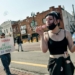 DETROIT, MI - JUNE 14, 2025: A protestor blows bubbles as a few thousand Metro Detroit activists march from Clark Park to a Detroit Federal Building near downtown Detroit, MI for No Kings Day on June 14, 2025 to show support for the immigrant community, denounce the rise of authoritarianism and the ongoing ICE raids, and to show solidarity with Los Angeles after President Trump deployed the National Guard and U.S. Marines to L.A. in response to large scale protests.
