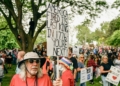 DETROIT, MI - JUNE 14, 2025: Approximately 4,000 Metro Detroit activists hold a No Kings Day rally at Clark Park in Detroit, Michigan on June 14, 2025 before marching through the streets of Southwest Detroit, home to the largest Hispanic population in the city, to show support for the immigrant community, denounce the rise of authoritarianism and the ongoing ICE raids, and to show solidarity with Los Angeles after President Trump deployed the National Guard and U.S. Marines to L.A. in response to large scale protests.