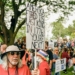 DETROIT, MI - JUNE 14, 2025: Approximately 4,000 Metro Detroit activists hold a No Kings Day rally at Clark Park in Detroit, Michigan on June 14, 2025 before marching through the streets of Southwest Detroit, home to the largest Hispanic population in the city, to show support for the immigrant community, denounce the rise of authoritarianism and the ongoing ICE raids, and to show solidarity with Los Angeles after President Trump deployed the National Guard and U.S. Marines to L.A. in response to large scale protests.