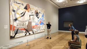 Tyler Taylor, Associate Educator at Detroit Institute of Arts with local educators from Wayne County. (Charles McGee Artist, ‘Noah’s Ark Genesis)
