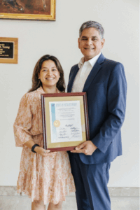 District 6 Detroit City Councilmember Gabriela Santiago-Romero stands alongside Felix M. Valbuena, CEO of CHASS, as they proudly hold the Spirit of Detroit Award. Photo courtesy City of Detroit.