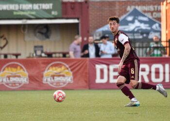 Jay Chapman (#6) looks to make a pass