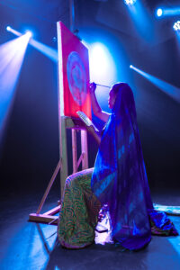 Detroit- based artist Dayana Juarez creating a painting live during the Fiesta House Dj sets.