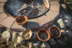 The sacred fired and medicine: tobacco, cedar, sage, and sweetgrass.