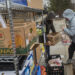 Volunteers collect fresh food to deliver to immigrant families.